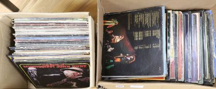 A collection of approximately 87 vinyl LPs to include The Beatles, David Bowie, Traffic, 10CC, Carly