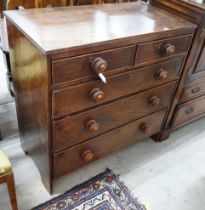An early 19th century provinical oak chest of two short and three long drawers, width 93cm, depth