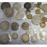 A group of UK coins including 1819, 1821 and 1891 crowns, two 1887 half crowns, 1887 florin, etc.