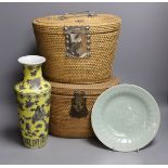 Two wicker-cased Chinese porcelain teapots together with a Chinese celadon dish and yellow vase,