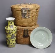 Two wicker-cased Chinese porcelain teapots together with a Chinese celadon dish and yellow vase,