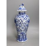 A Chinese blue and white 'dragon' vase and cover, Kangxi mark but 19th century. 33cm