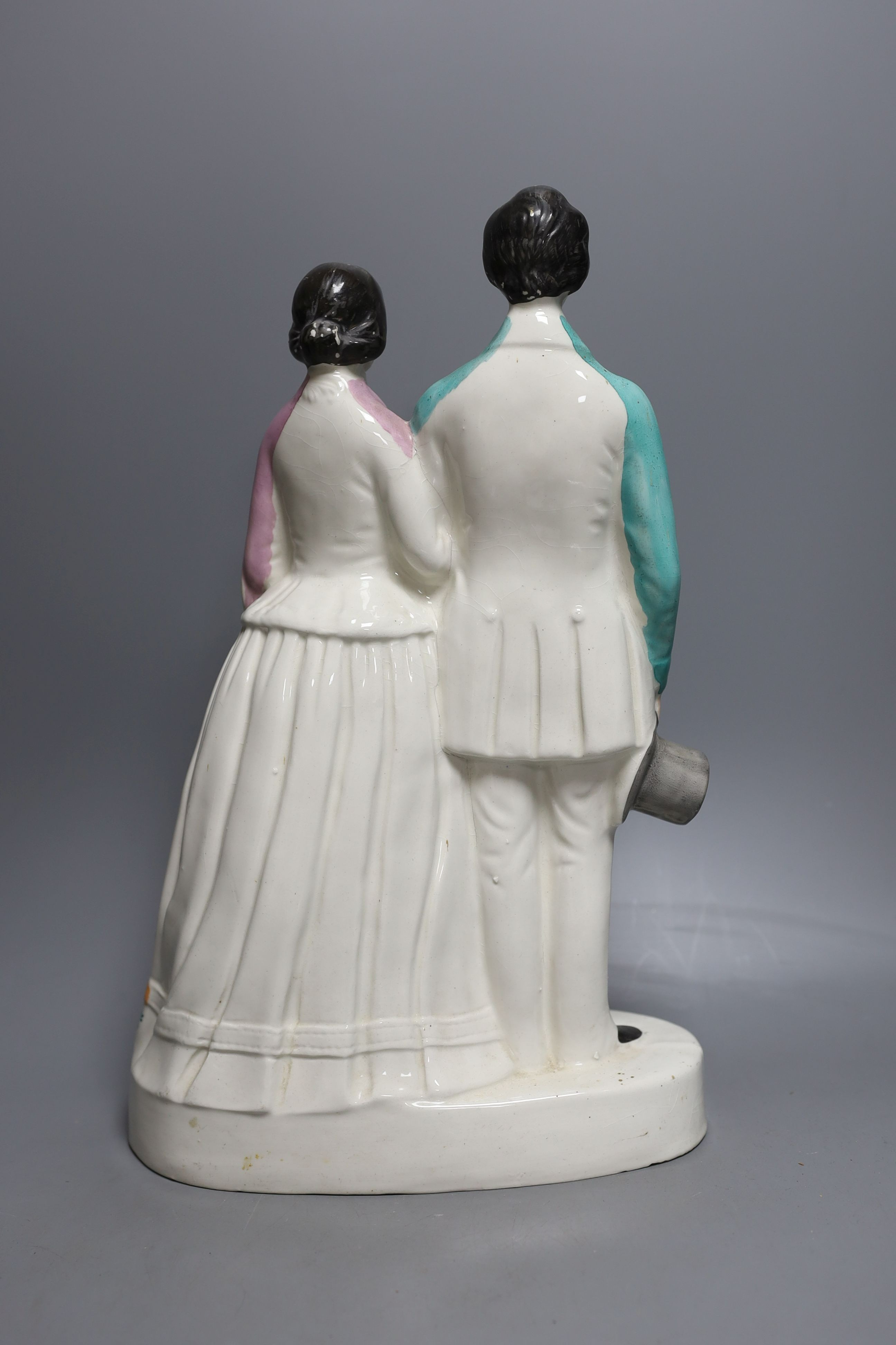 A Staffordshire portrait group of a couple possibly Victoria and Albert. 37cm - Image 2 of 3