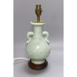 A Chinese celadon glazed two handled table lamp