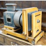 A Victorian oak magic lantern converted to electricity