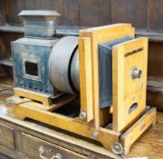 A Victorian oak magic lantern converted to electricity