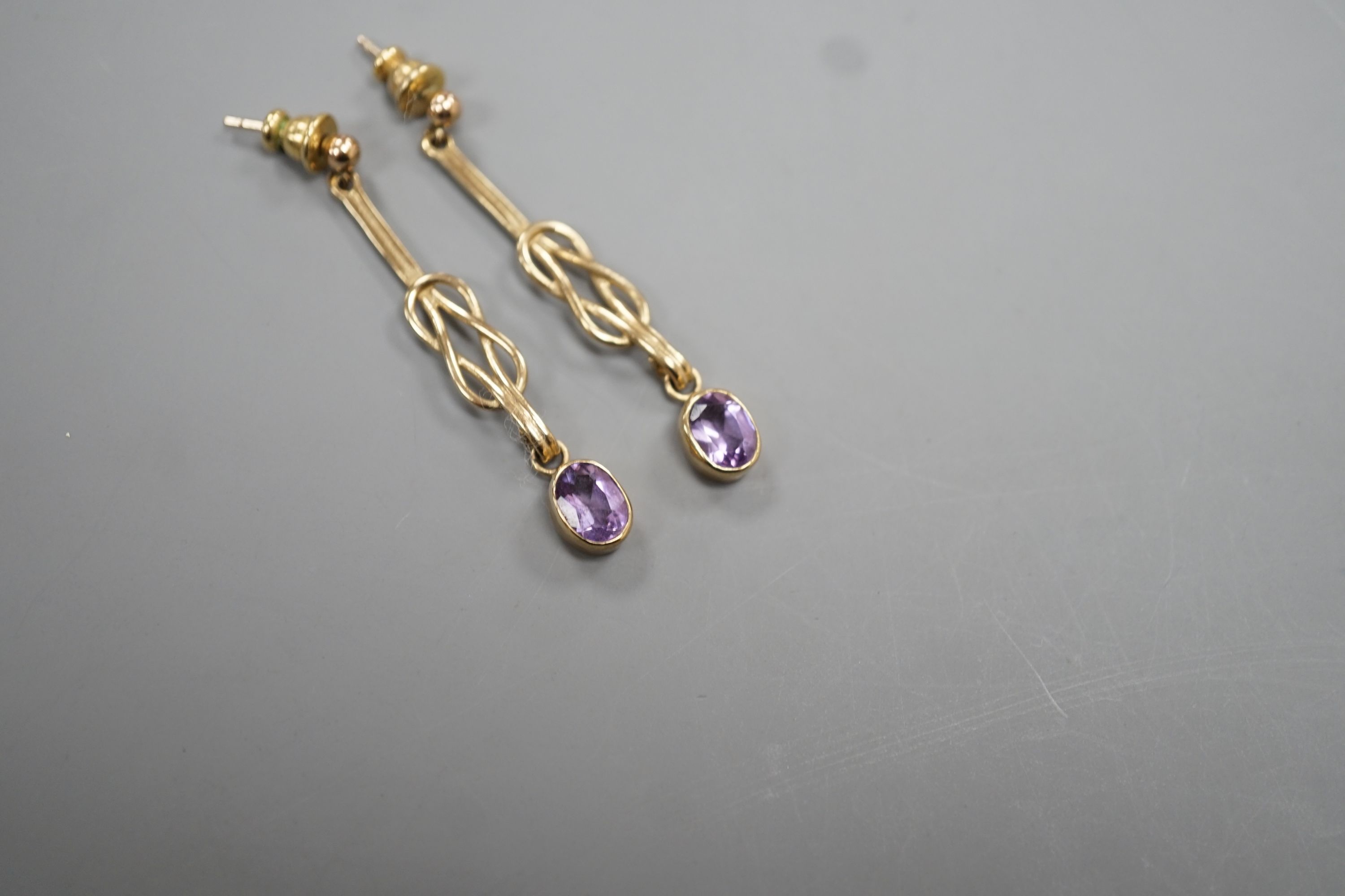 A modern pair of 9ct gold and amethyst set drop earrings, 4cm, gross 3.8 grams. - Image 2 of 3
