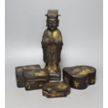 A Chinese bronze figure of an official and three Japanese lacquer boxes. Tallest 29cm