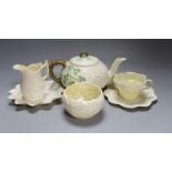 Matching Belleek sugar bowl milk jug and dish together with another Baleek cup and saucer and teapot