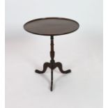 A George III circular mahogany tilt top tripod tea table, diameter 61cm height 70cm