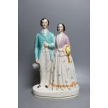 A Staffordshire portrait group of a couple possibly Victoria and Albert. 37cm