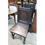 A pair of late Victorian 17th century style carved oak side chairs