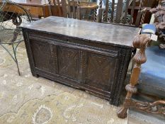 A 17th century carved oak coffer, length 110cm, depth 52cm, height 61cm