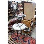 A wrought iron mosaic top circular bistro table, diameter 60cm, height 70cm together with a pair