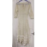 An Edwardian white worked and lace inserted ladies croquet garden dress