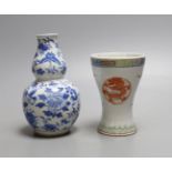 A 19th century Chinese blue and white gourd shape vase and a Chinese cup with inscription on