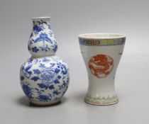 A 19th century Chinese blue and white gourd shape vase and a Chinese cup with inscription on