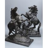 A pair of spelter Marly horse groups - 43cm tall