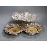 A pair of Victorian Sheffield plate wine coasters and plated comport, 13 cms high.