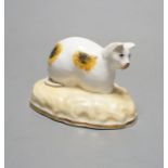 A rare Samuel Alcock porcelain model of a recumbent cat, circa 1835-50, impressed ‘6’, Cf. Dennis G.