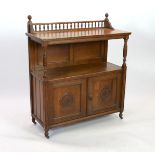 A late Victorian oak buffet, width 113cm depth 47cm height 133cm