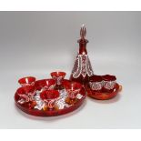 A Venetian red enamelled glass lace-pattern liqueur set