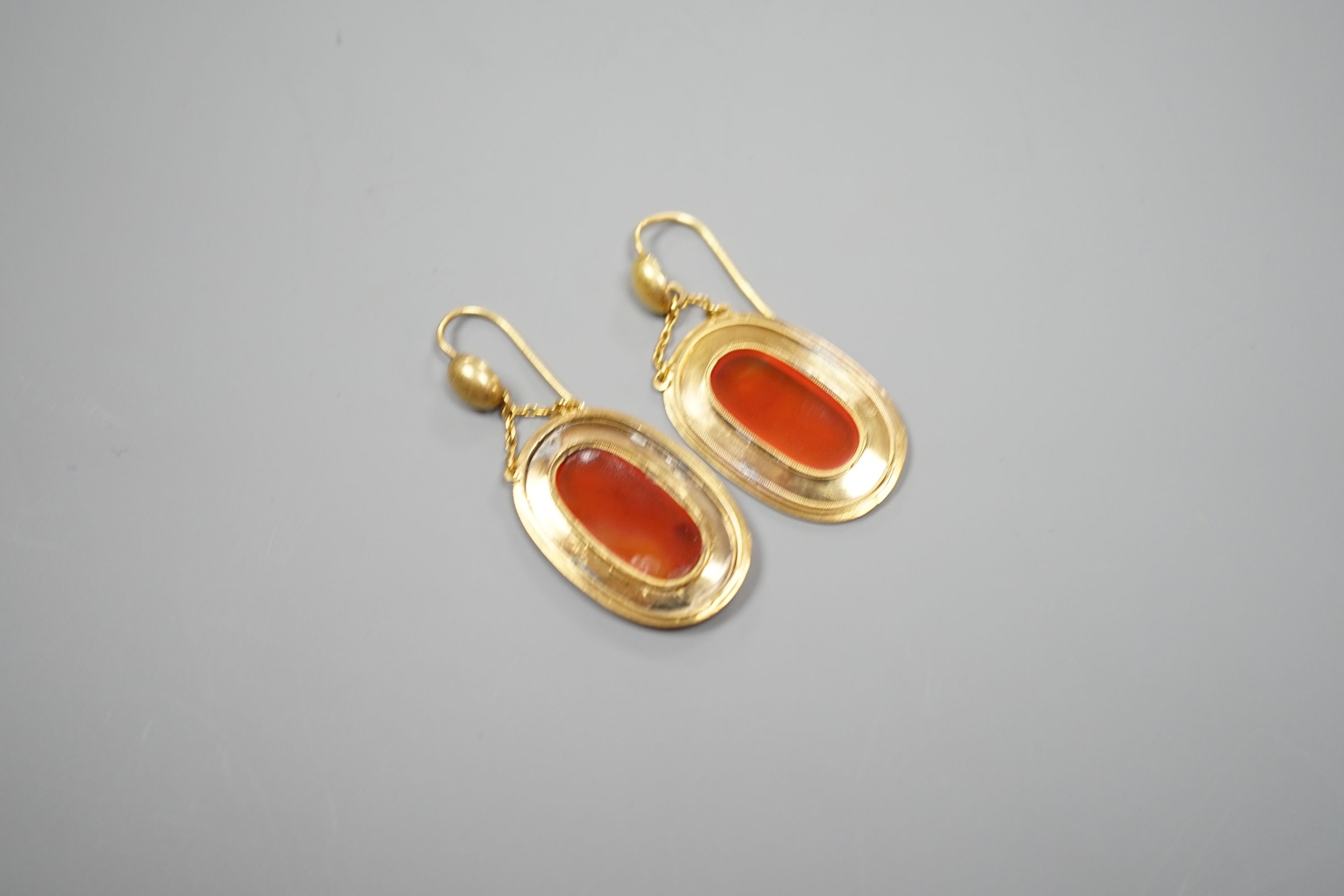 A pair of yellow metal and orange agate set oval drop earrings, overall 46mm, gross 6.8 grams. - Image 3 of 4