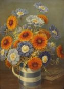 English School c.1910, oil on canvas, Still life of flowers in a Cornish ware jug, 50 x 36cm