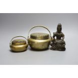 Two Chinese bronze hand warmers, one with Xuande mark, together with a seated Buddha, 16cm tall, (