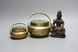 Two Chinese bronze hand warmers, one with Xuande mark, together with a seated Buddha, 16cm tall, (