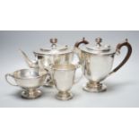 A George V silver four piece pedestal tea set, Brook & Son, Sheffield, 1926/7,gross weight 66.5oz.