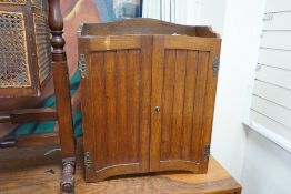 A late Victorian / Edwardian oak stationery cabinet with file interior, width 57cm, depth 29cm,