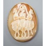 A yellow metal mounted oval cameo shell pendant brooch, carved with The Three Graces, 62mm, gross