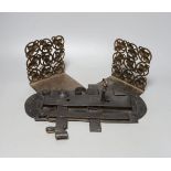 A 19th century or earlier iron lock, 31cm long, and a pair of 19th century pierced steel bookends