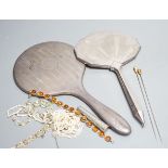 Two silver mounted hand mirrors and a small group of minor jewellery and a silver cigarette holder