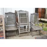 A set of six folding weathered teak garden chairs, labelled Firman, width 54cm, depth 42cm, height