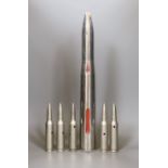 Polished steel military training round and five 50 calibre rounds