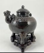 An unusual Chinese black ware tenmoku glazed tripod wine pot, 19th/20th century, with camel head