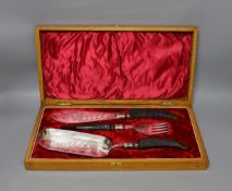 Silver plated horn handle fish servers and crumb spoon in fitted case