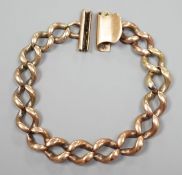 A yellow metal curb link bracelet, 14cm,20.6 grams.