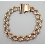 A yellow metal curb link bracelet, 14cm,20.6 grams.