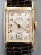 A gentleman's 1950's 14ct Lord Elgin manual wind wrist watch, with angular glass, Arabic dial and