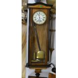 A Vienna Regulator wall clock,102 cms high.