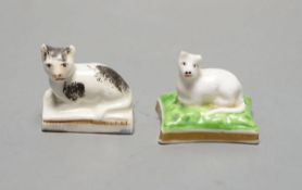 A rare Chamberlain Worcester model of a recumbent kitten, c.1820–40 and a Staffordshire porcelain