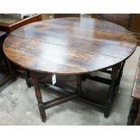 An 18th century oak gateleg table, 120cm extended, width 122cm, height 73cm