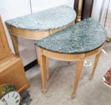 A near pair of reproduction pine marble topped D shaped console tables, larger width 83cm, depth