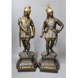 A pair of bronzed spelter gladiator figures - 55cm tall