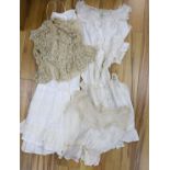 Five Victorian and Edwardian lace inserted camisole tops, a cream chemical lace jacket and a