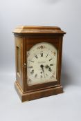 A mahogany chiming mantel clock