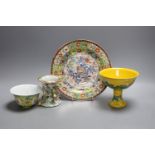 A Chinese yellow ground ‘dragon’ stem cup, a clobbered dish and two other pieces